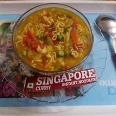 A picture of Singapore curry noodles soup.