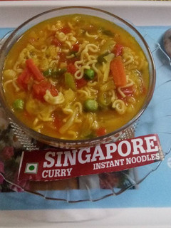 A picture of Singapore curry noodles soup.