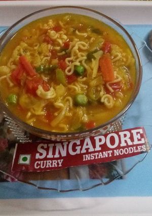 A picture of Singapore curry noodles soup.