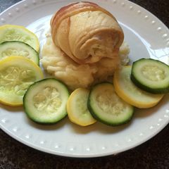 A picture of Bacon Wrapped Chicken Stuffed With Chive & Onion Cream Cheese.