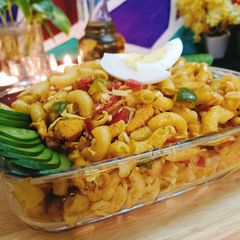A picture of Savory, Spicy Tikka Macroni 🍝🍊🍊🍜.