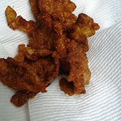 A picture of Spicy fried chicken skins.