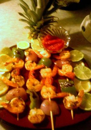 A picture of grilled shrimp kabobs.