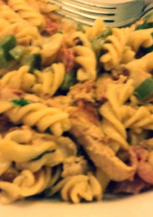 A picture of Chorizo pasta with Chicken and Bacon.