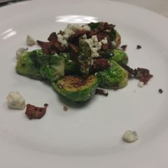 A picture of Brussel Sprouts with Bacon and Bleu.