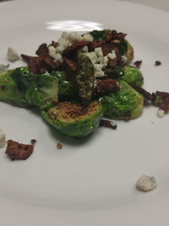 A picture of Brussel Sprouts with Bacon and Bleu.