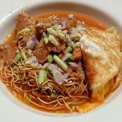 A picture of Otak Otak Noodle Soup.