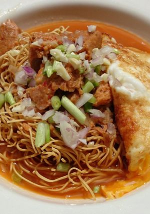 A picture of Otak Otak Noodle Soup.