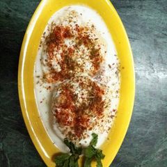 A picture of Moong Dal Dahi Vada.