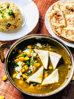 A picture of Corn palak paneer.