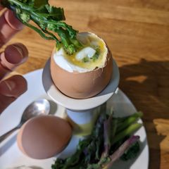 A picture of Purple sprouting broccoli egg dippers - gluten free egg soldiers.