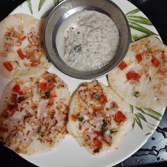 A picture of Mini onion tomato uttapam.