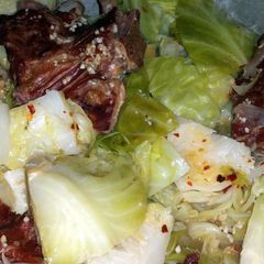 A picture of Southern style cabbage and neckbones.