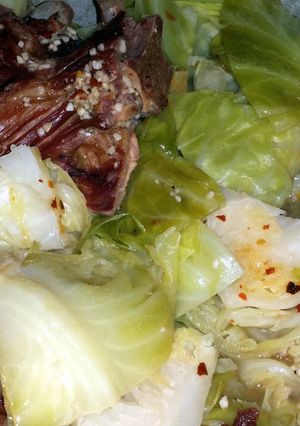A picture of Southern style cabbage and neckbones.