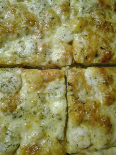 Una foto de Pizza de gambas