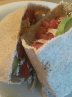 A picture of Olive oil and vinegar chicken salad pitas.