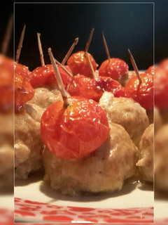 A picture of AMIEs Baked MEATballs with Cherry Tomatoes.