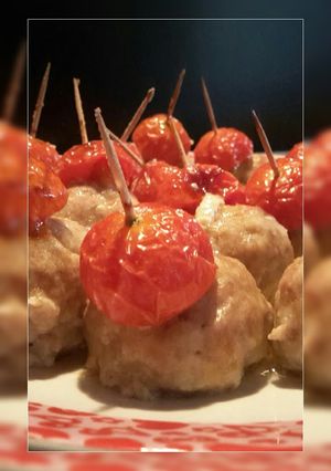 A picture of AMIEs Baked MEATballs with Cherry Tomatoes.