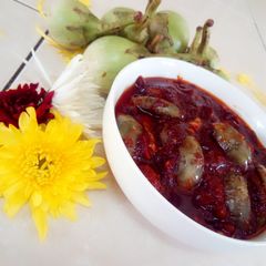 A picture of Fried Brinjal sweet n sour curry.