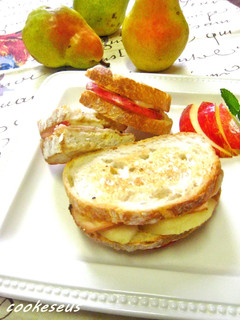 A picture of Ham and Cheese Sandwich with Pears.