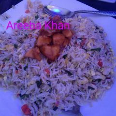 A picture of Chinese Fried Rice With Chicken Manchurian.