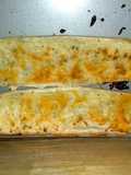Q-tip's cheesy garlic bread