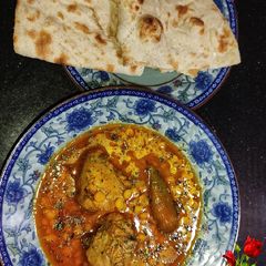 A picture of Chicken With Daal Chaana.
