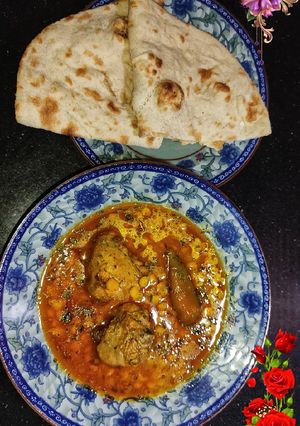 A picture of Chicken With Daal Chaana.