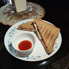 A picture of Paneer Onion Tomato 🍅 Cucumber 🥒 Sandwich with Brown Bread..