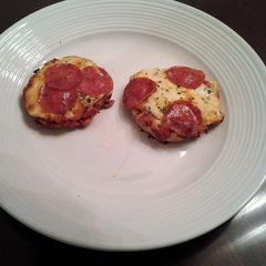 A picture of English muffin Pizzas.