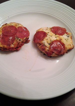 A picture of English muffin Pizzas.