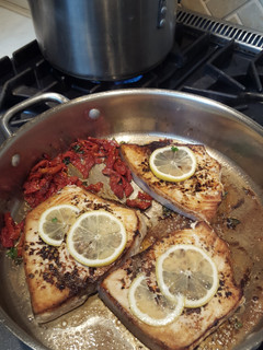 A picture of Swordfish W/ Sundried Tomatoes, Parsley, and Lemon, and Pesto Farfale.