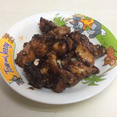 A picture of Pork spare ribs honey citron sauce .