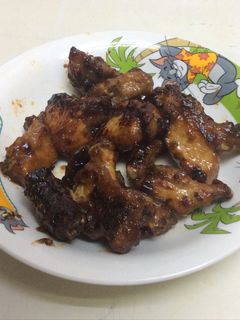 A picture of Pork spare ribs honey citron sauce .