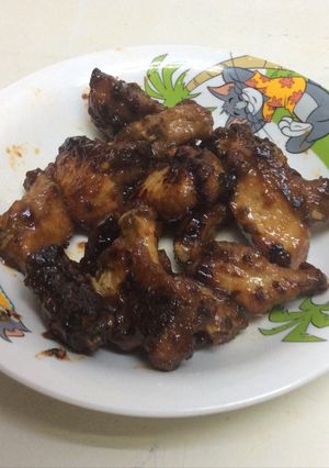 A picture of Pork spare ribs honey citron sauce .