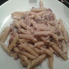 A picture of Four cheese penne with mushrooms, pancetta and toasted walnuts.