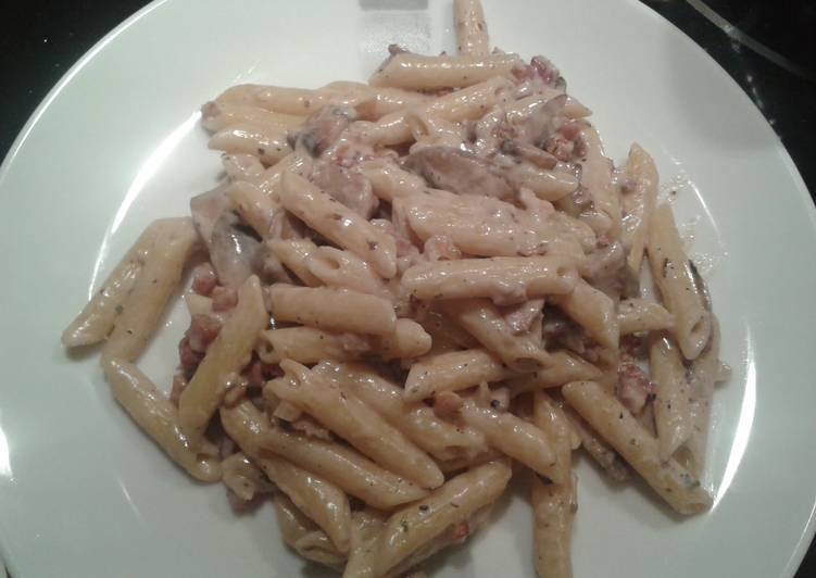 Four cheese penne with mushrooms, pancetta and toasted walnuts