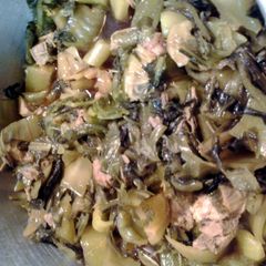 A picture of pickled mustard and roasted boston butt roast.