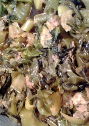 A picture of pickled mustard and roasted boston butt roast.