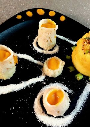 A picture of SEMOLINA DHOKLA SHOT GLASS with MONGO RAS (ras - dhokla).