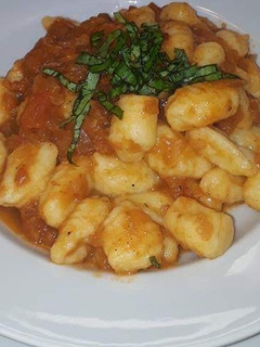 Una foto de Ñoquis Caseros de Papa en Salsa de Tomate