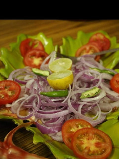 A picture of Garden Fresh-Tomato Onion Salad.
