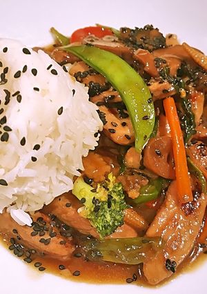 A picture of Asian Pork and vegetable in spicy garlic brown sauce.