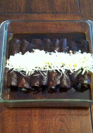 A picture of Mole Negro Enchiladas.