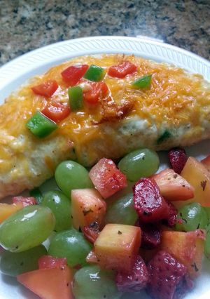 A picture of Cheesy Egg White Turkey Omelette.