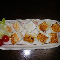A picture of Pan-Fried Hanpen Sandwiches with Ham & Cheese.