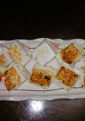 A picture of Pan-Fried Hanpen Sandwiches with Ham & Cheese.