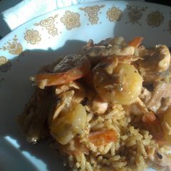 A picture of Garlic Seafood with chili rice.
