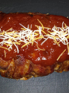 A picture of Bacon-wrapped Meatloaf.