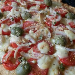 A picture of Sig's Potato Cake Pizza.